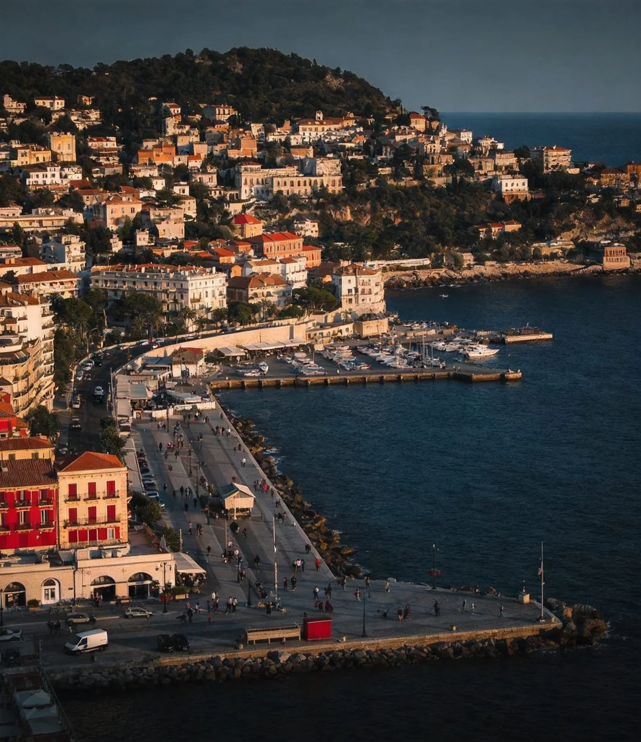 A coastal town and harbour at dusk